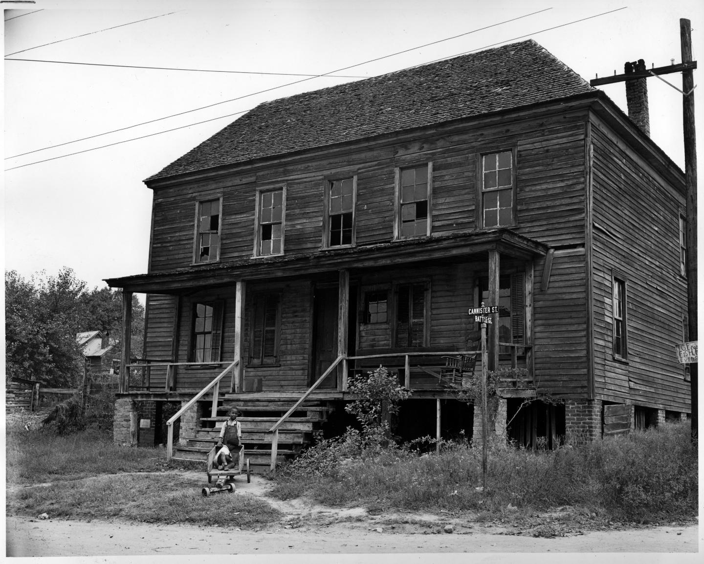 Children are seen on the corner of Cannister and Battle Streets, ca. 1939
